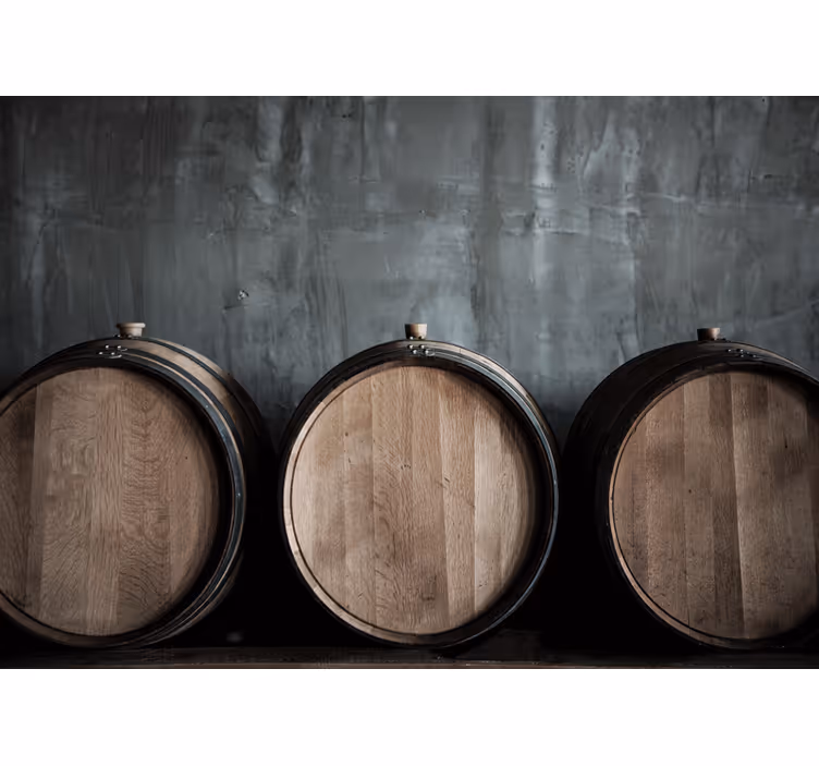 Stone wall mural wooden barrel arrangement - TenStickers